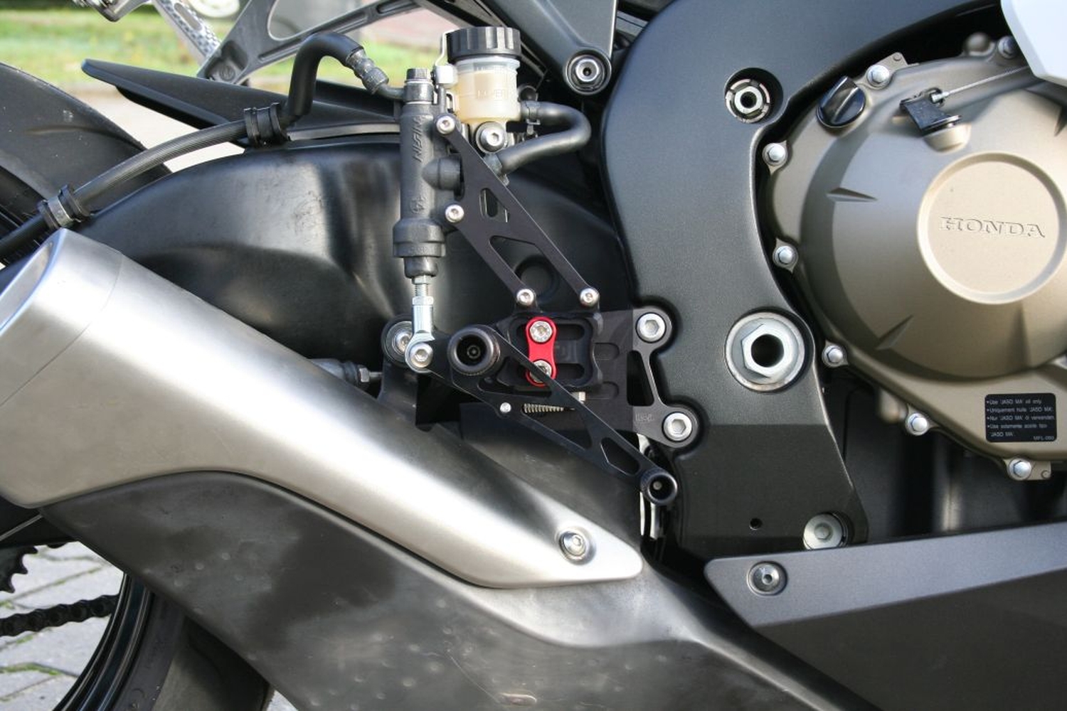 Sistema de estriberas LSL 2Slide para Honda CBR1000RR, 2008-, negro-rojo