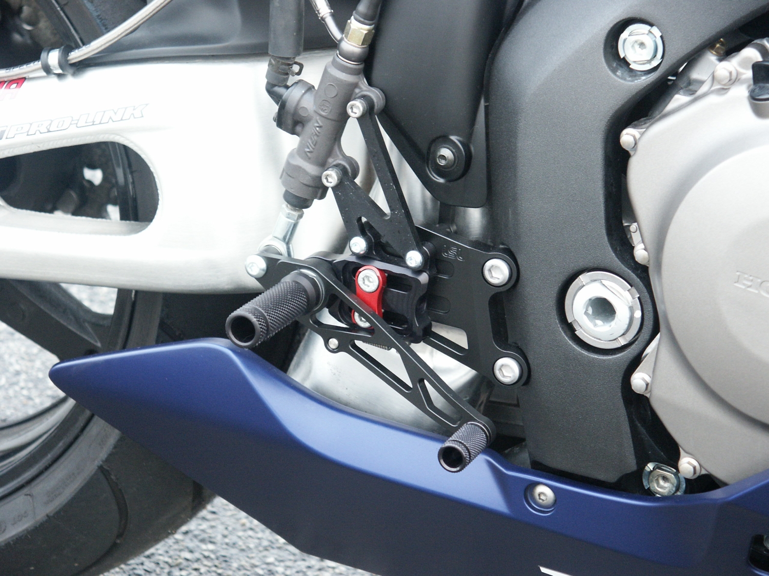 Sistema de estriberas LSL 2Slide para Honda CBR1000RR, 2006-2007, negro-rojo